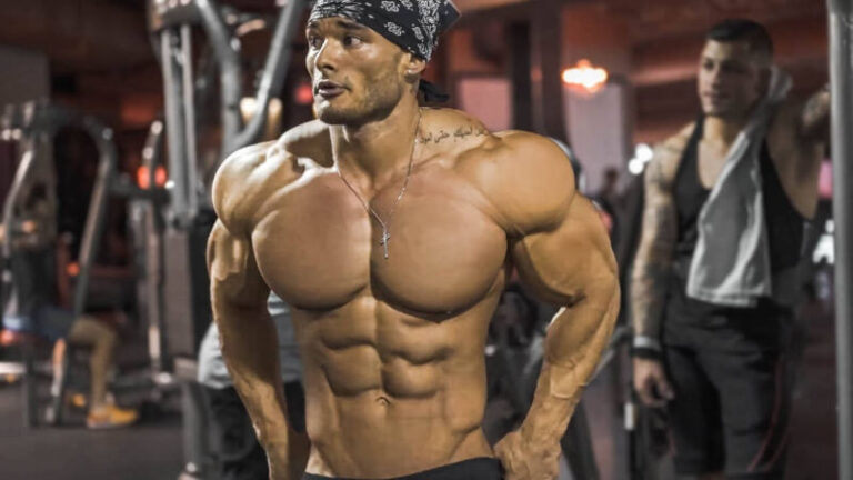 Download Bodybuilder Inside A Gym HD Wallpaper | Wallpapers.com