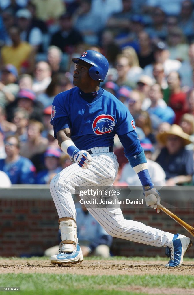 Sammy Sosa of the Chicago Cubs swings during the MLB game against the ...